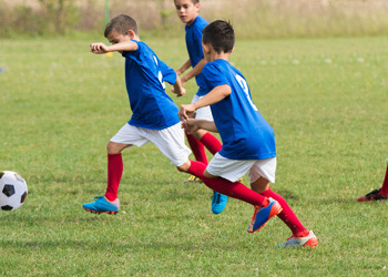 First Choice Chiropractic Chiropractor Brisbane Children Playing Soccer